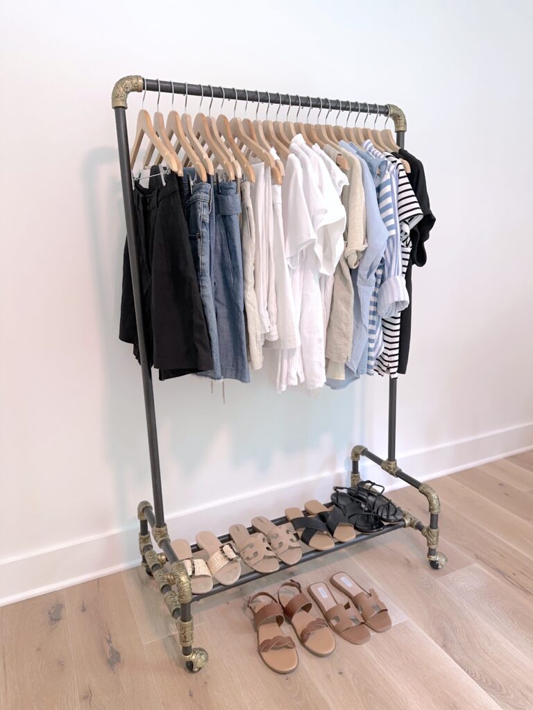 MY 29 PIECE FRENCH RIVIERA CASUAL SUMMER CAPSULE WARDROBE - clothes rack side
